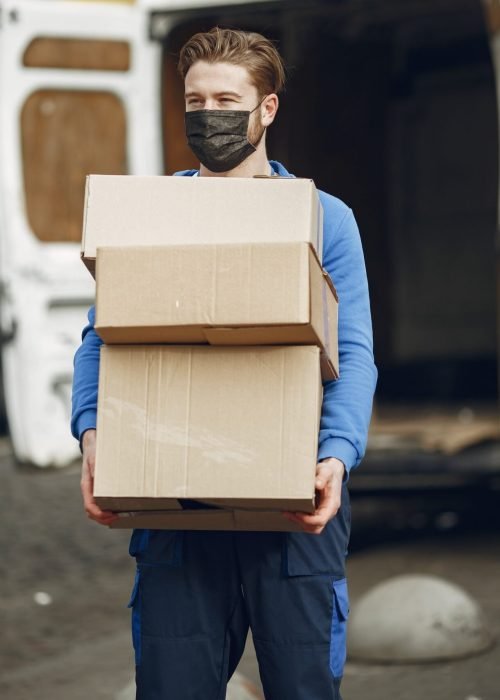 delivery-man-with-package-outdoors-e1746489789755 (2)