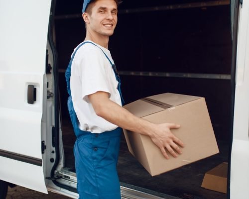 deliveryman-unloads-the-car-with-parcels-delivery (1)